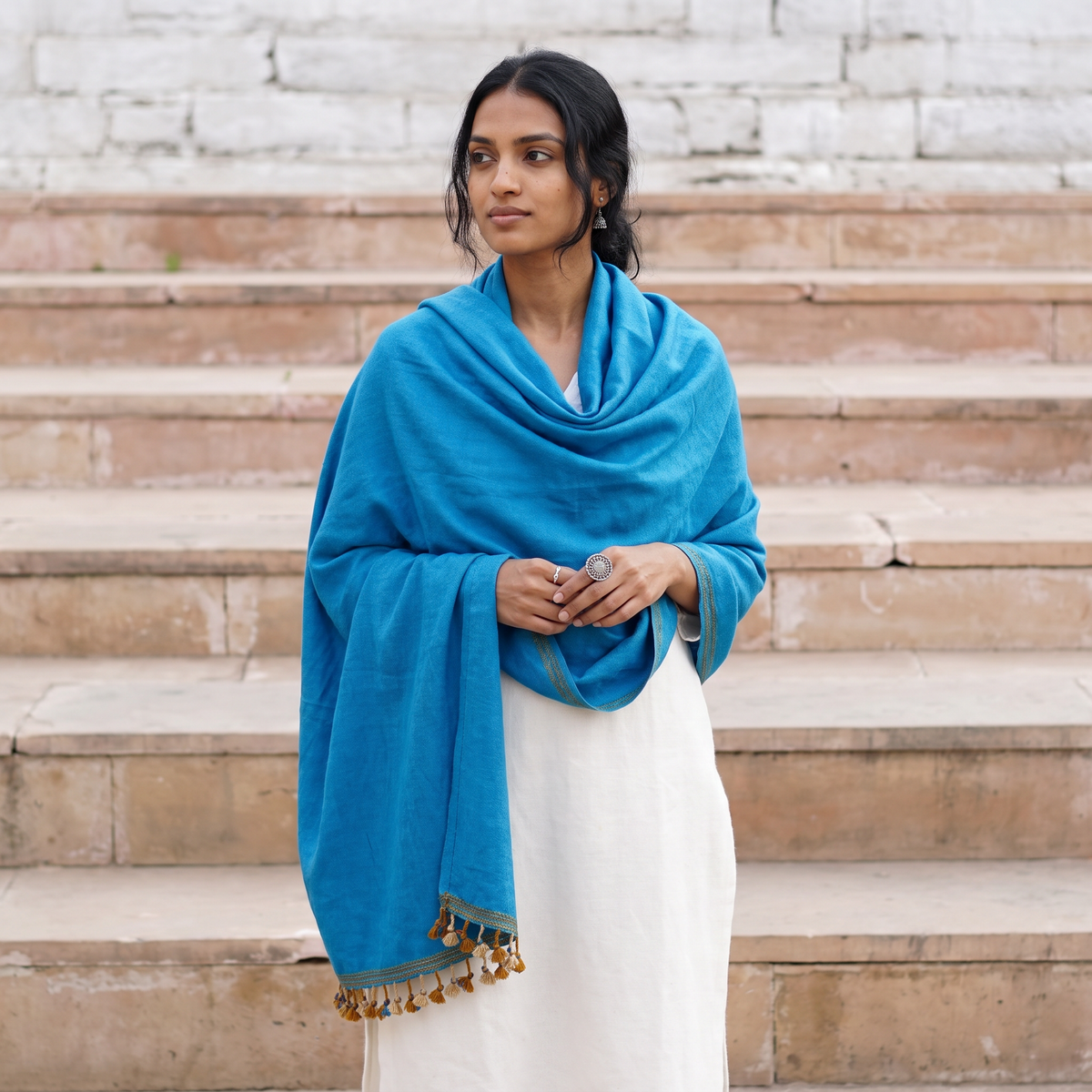 Blue Kutch Handwoven Merino Wool Shawl, worn by a model, AI visual of the shawl, iTokri
