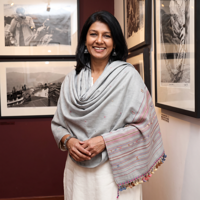 Grey Kutch Handwoven Merino Wool Shawl, worn by a model, AI visual of the shawl, iTokri