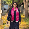 Pink Kutch Handwoven Merino Wool Shibori & Bandhani Stole, worn by a woman, AI visual of the stole, iTokri