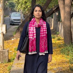 Pink Kutch Handwoven Merino Wool Shibori & Bandhani Stole, worn by a woman, AI visual of the stole, iTokri