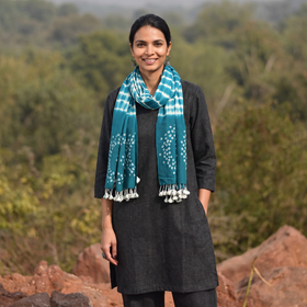 Blue Kutch Handwoven Merino Wool Shibori & Bandhani Stole, worn by a woman, AI visual of the stole, iTokri