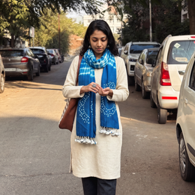 Blue Kutch Handwoven Merino Wool Shibori & Bandhani Stole, worn by a woman, AI visual of the stole, iTokri