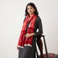 Red Kutch Handwoven Merino Wool Shibori & Bandhani Stole, worn by a woman, AI visual of the stole, iTokri