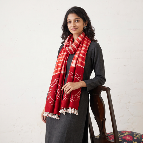 Red Kutch Handwoven Merino Wool Shibori & Bandhani Stole, worn by a woman, AI visual of the stole, iTokri