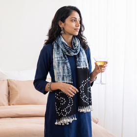 Black Kutch Handwoven Merino Wool Shibori & Bandhani Stole, worn by a woman, AI visual of the stole, iTokri
