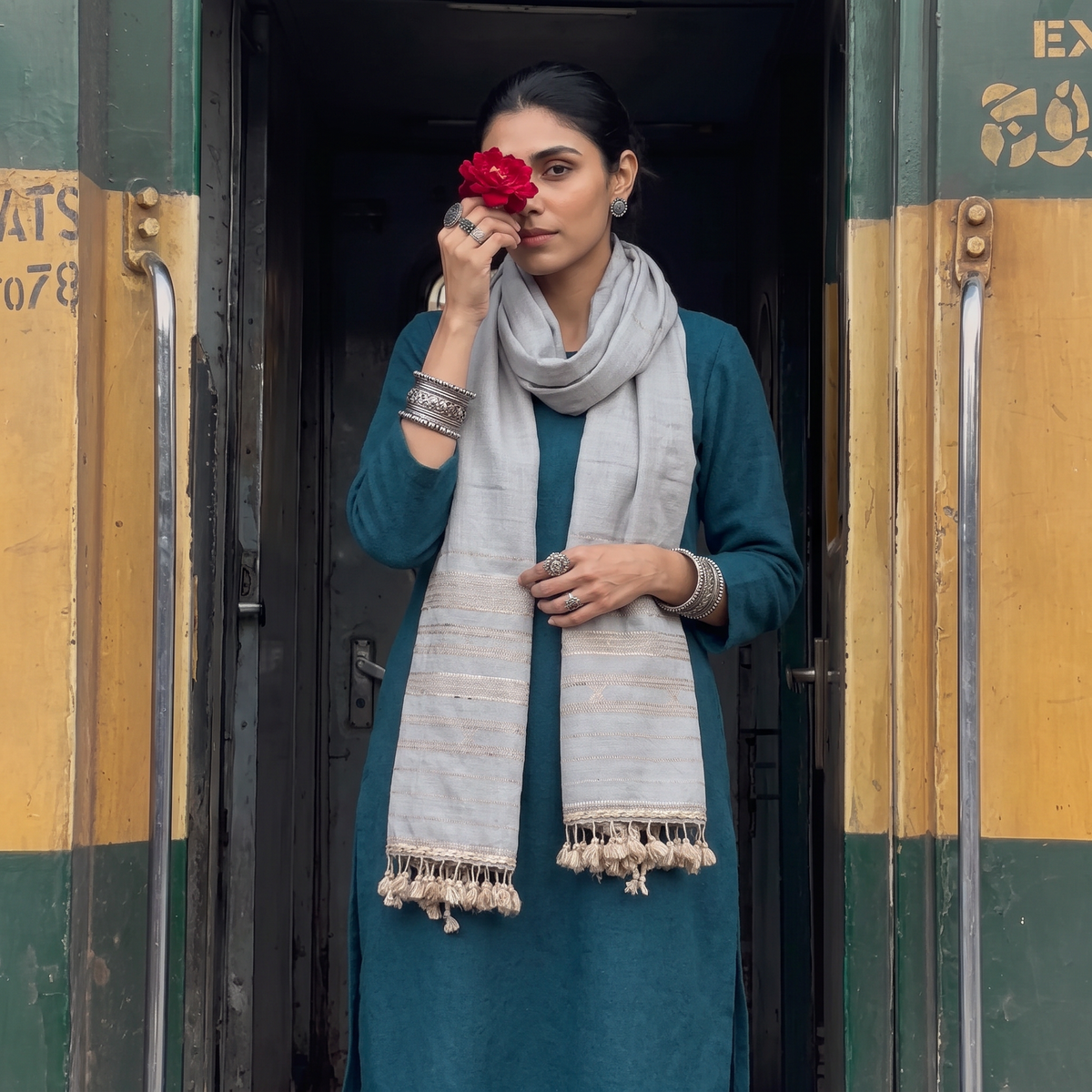 Grey Kutch Handwoven Merino Wool Stole, worn by a woman, AI visual of the stole, iTokri
