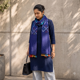 Blue Kutch Handwoven Merino Wool Tie-Dye Bandhani Stole, worn by a woman, AI visual of the stole, iTokri