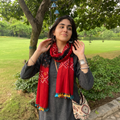 Red Kutch Handwoven Merino Wool Tie-Dye Bandhani Stole, worn by a woman, AI visual of the stole, iTokri