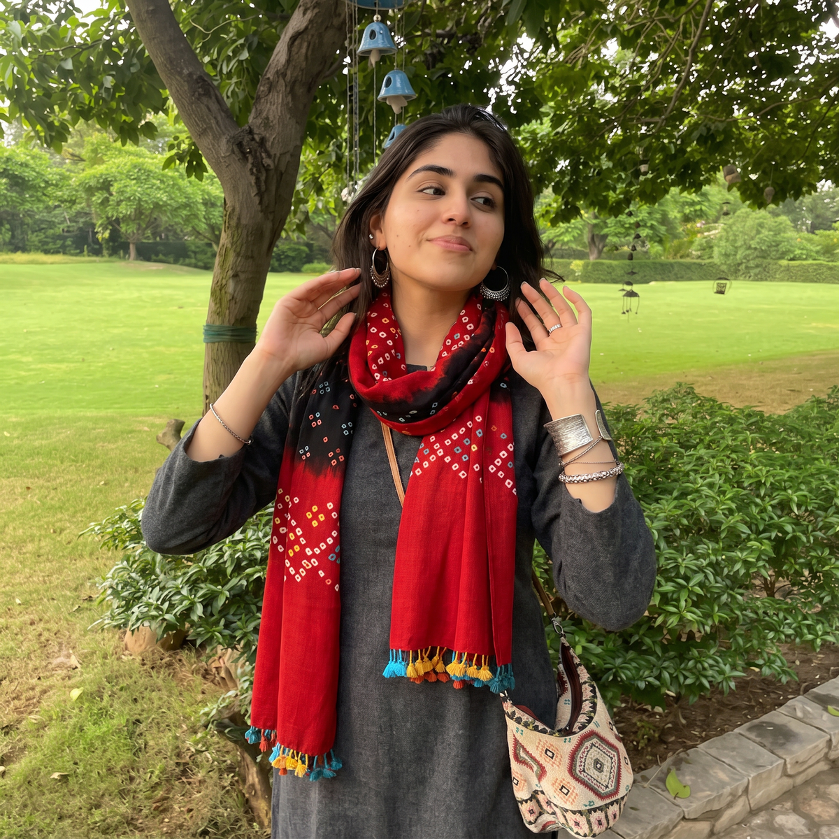 Red Kutch Handwoven Merino Wool Tie-Dye Bandhani Stole, worn by a woman, AI visual of the stole, iTokri
