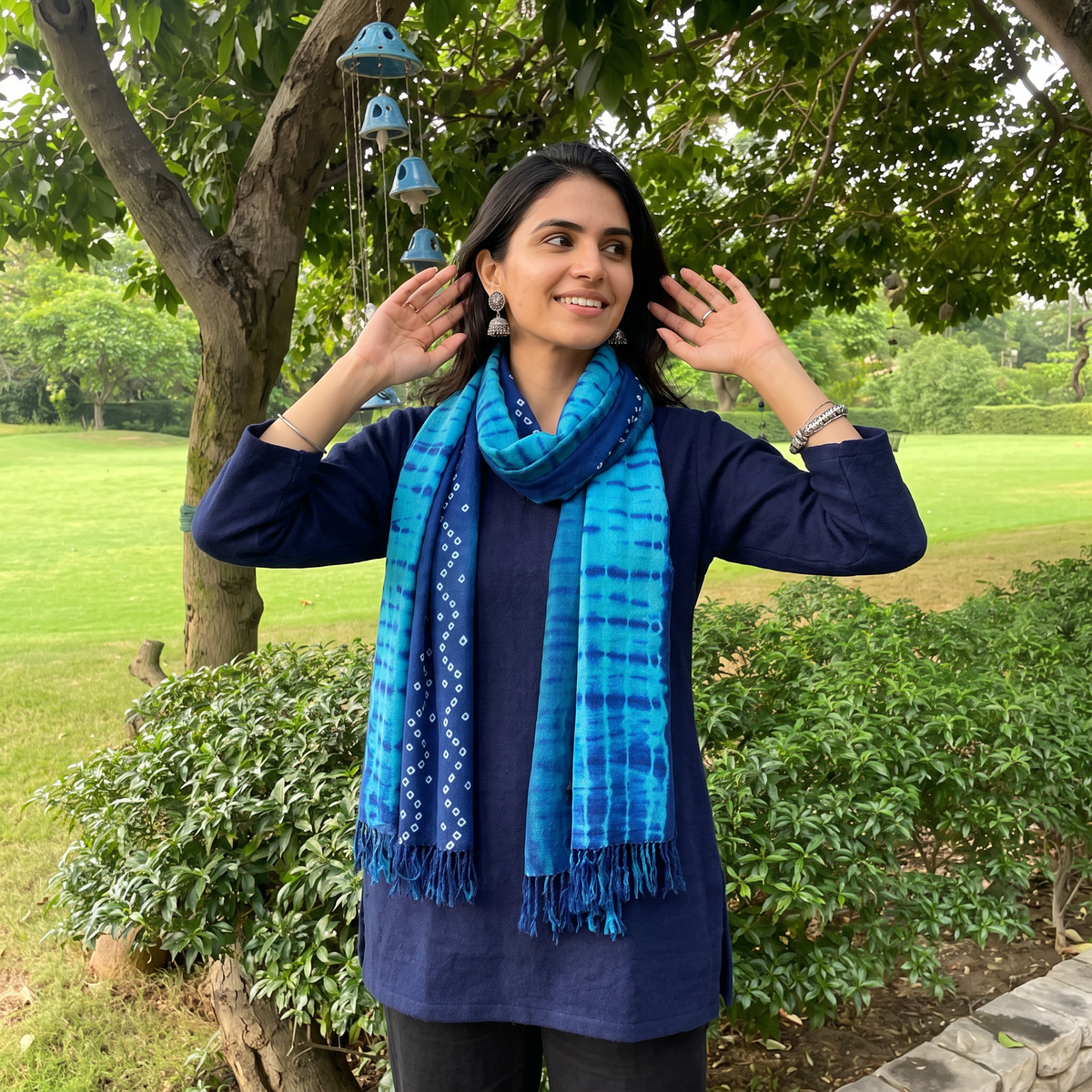 Blue Kutch Handwoven Merino Woolen Shibori & Bandhani Stole, worn by a woman, AI visual of the stole, iTokri