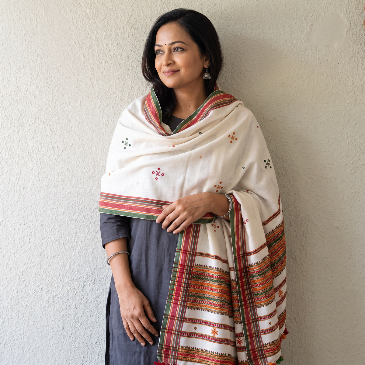 White Kutch Handwoven Mirror Work Acrylic Wool Shawl, worn by a model, AI visual of the shawl, iTokri