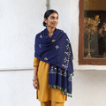 Blue Kutch Handwoven Mirror Work Acrylic Wool Shawl, worn by a model, AI visual of the shawl, iTokri