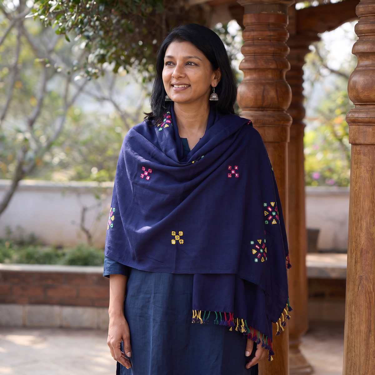 Blue Kutch Handwoven Mirror Work Acrylic Wool Shawl, worn by a model, AI visual of the shawl, iTokri