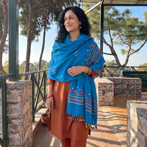 Blue Kutch Handwoven Mirror Work Acrylic Wool Shawl, worn by a model, AI visual of the shawl, iTokri