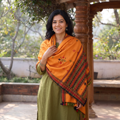 Orange Kutch Handwoven Mirror Work Acrylic Woollen Shawl, worn by a model, AI visual of the shawl, iTokri