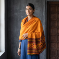 Orange Kutch Handwoven Mirror Work Acrylic Woollen Shawl, worn by a model, AI visual of the shawl, iTokri