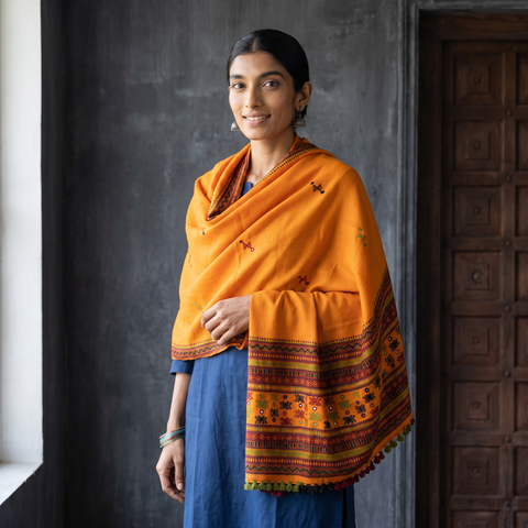 Orange Kutch Handwoven Mirror Work Acrylic Woollen Shawl, worn by a model, AI visual of the shawl, iTokri