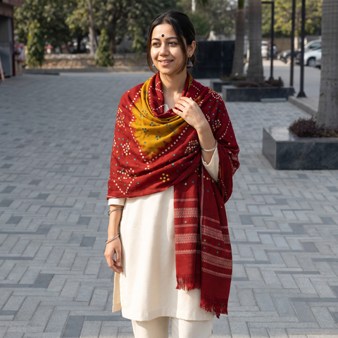 Red Kutch Handwoven Mirror Work Bandhani Tie-Dye Bagida Merino Wool Shawl, worn by a model, AI visual of the shawl, iTokri