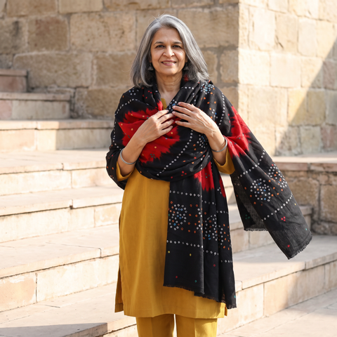 Black Kutch Handwoven Mirror Work Bandhani Tie-Dye Bagida Merino Wool Shawl, worn by a model, AI visual of the shawl, iTokri