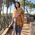 Beige Kutch Handwoven Mirror Work Chomuk Buta Acrylic Wool Shawl, worn by a model, AI visual of the shawl, iTokri