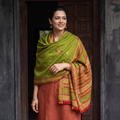 Green Kutch Handwoven Mirror Work Chomuk Buta Acrylic Wool Shawl, worn by a model, AI visual of the shawl, iTokri