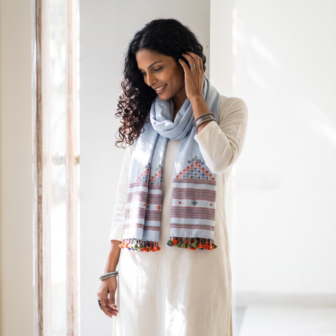 Blue Kutch Handwoven Mirror Work Merino Wool Embroidered Stole, worn by a woman, AI visual of the stole, iTokri