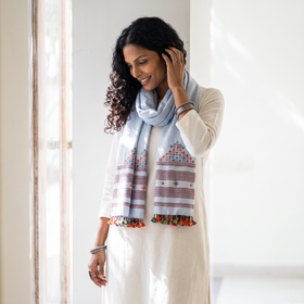 Blue Kutch Handwoven Mirror Work Merino Wool Embroidered Stole, worn by a woman, AI visual of the stole, iTokri