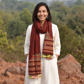Maroon Kutch Handwoven Mirror Work Merino Wool Embroidered Stole, worn by a woman, AI visual of the stole, iTokri