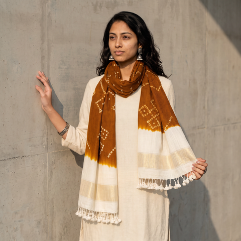 Brown Kutch Handwoven Tie & dye Merino Wool Bandhani Stole, worn by a woman, AI visual of the stole, iTokri