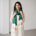 Green Kutch Handwoven Tie & dye Merino Wool Bandhani Stole, worn by a woman, AI visual of the stole, iTokri