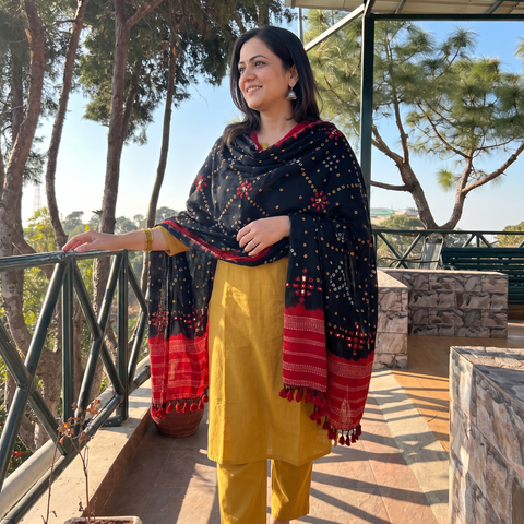 Black Kutch Mirror Work Handwoven Bandhani Merino Wool Shawl, worn by a model, AI visual of the shawl, iTokri