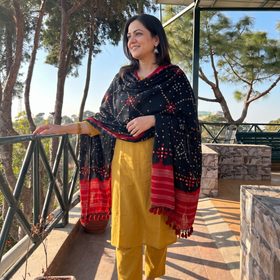 Black Kutch Mirror Work Handwoven Bandhani Merino Wool Shawl, worn by a model, AI visual of the shawl, iTokri