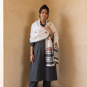 White Kutch Mirror Work Handwoven Neran Hand Embroidery Acrylic Wool Shawl, worn by a model, AI visual of the shawl, iTokri