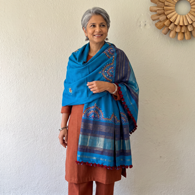 Blue Kutch Neran Hand Embroidery Mirror Work Acrylic Woollen Shawl, worn by a model, AI visual of the shawl, iTokri