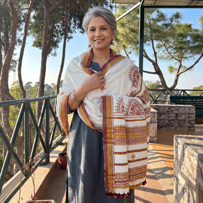 White Kutch Neran Hand Embroidery Mirror Work Acrylic Woollen Shawl, worn by a model, AI visual of the shawl, iTokri