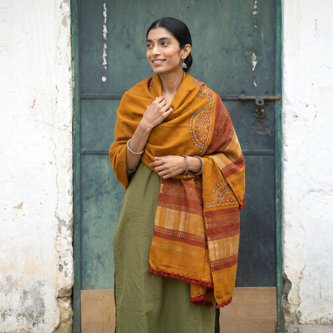 Orange Kutch Neran Hand Embroidery Mirror Work Acrylic Woollen Shawl, worn by a model, AI visual of the shawl, iTokri