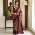 Brown and maroon Kutch tie-dye Bandhani cotton saree, draped and worn by a woman, by artisan Shabana Khatri, AI visual of the saree, iTokri