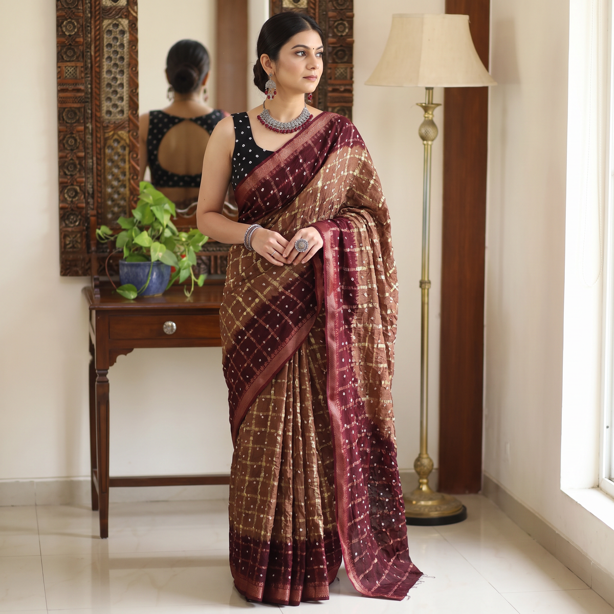 Brown and maroon Kutch tie-dye Bandhani cotton saree, draped and worn by a woman, by artisan Shabana Khatri, AI visual of the saree, iTokri