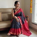 Blue and red Kutch tie-dye Bandhani cotton saree, draped and worn by a woman, by artisan Shabana Khatri, AI visual of the saree, iTokri