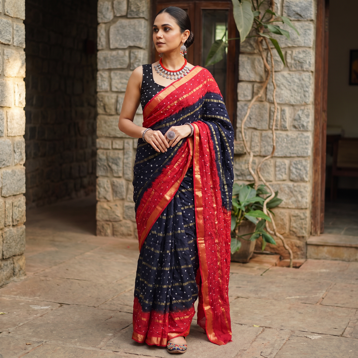 Blue and red Kutch tie-dye Bandhani cotton saree, draped and worn by a woman, by artisan Shabana Khatri, AI visual of the saree, iTokri
