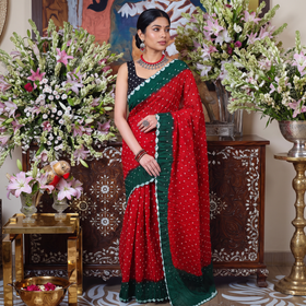 Red and green Kutch tie-dye Bandhani cotton saree, draped and worn by a woman, by artisan Shabana Khatri, AI visual of the saree, iTokri