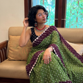 Green and maroon Kutch tie-dye Bandhani cotton saree, draped and worn by a woman, by artisan Shabana Khatri, AI visual of the saree, iTokri