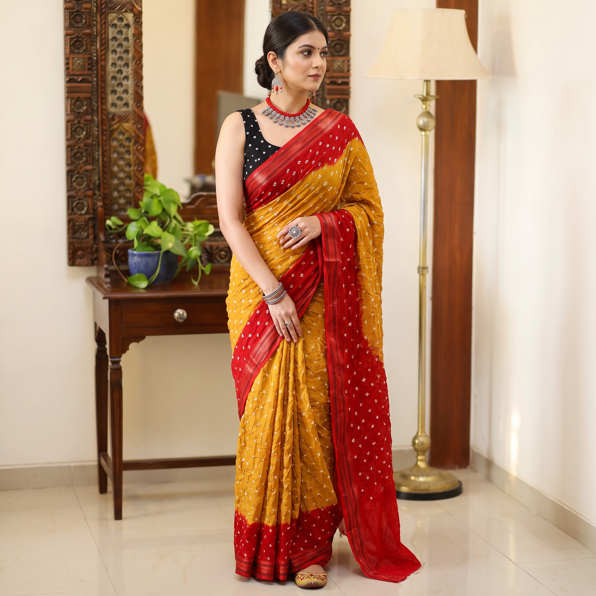 Mustard yellow and red Kutch tie-dye Bandhani cotton saree, draped and worn by a woman, by artisan Shabana Khatri, AI visual of the saree, iTokri