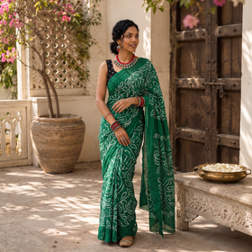 Green Kutch tie-dye cotton Bandhani saree, draped and worn by a woman, AI visual of the saree, iTokri