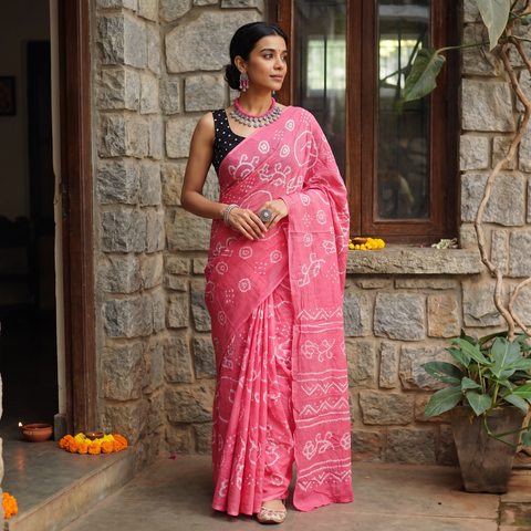 Pink Kutch tie-dye cotton Bandhani saree, draped and worn by a woman, AI visual of the saree, iTokri