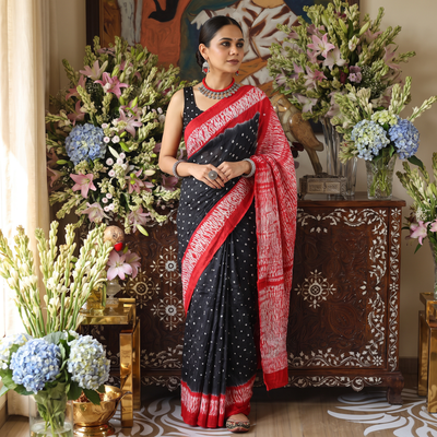Grey Kutch tie-dye cotton Bandhani saree, draped and worn by a woman, AI visual of the saree, iTokri