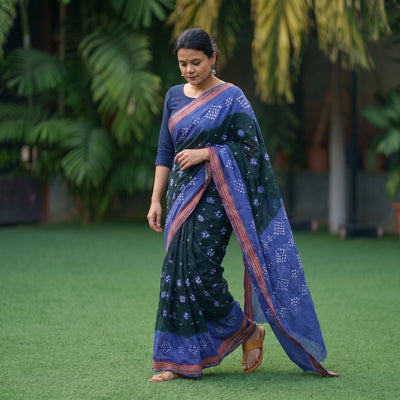 Green Kutch Tie-Dye Cotton Bandhani Saree with Blouse Piece, draped and worn by a woman, AI visual of the saree, iTokri