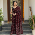 Maroon Kutch tie-dye pure cotton Bandhani saree, draped and worn by a woman, AI visual of the saree, iTokri
