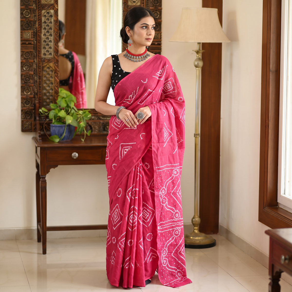 Pink Kutch tie-dye pure mul cotton rai Bandhani saree, draped and worn by a woman, AI visual of the saree, iTokri