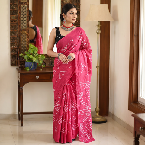 Pink Kutch tie-dye pure mul cotton rai Bandhani saree, draped and worn by a woman, AI visual of the saree, iTokri